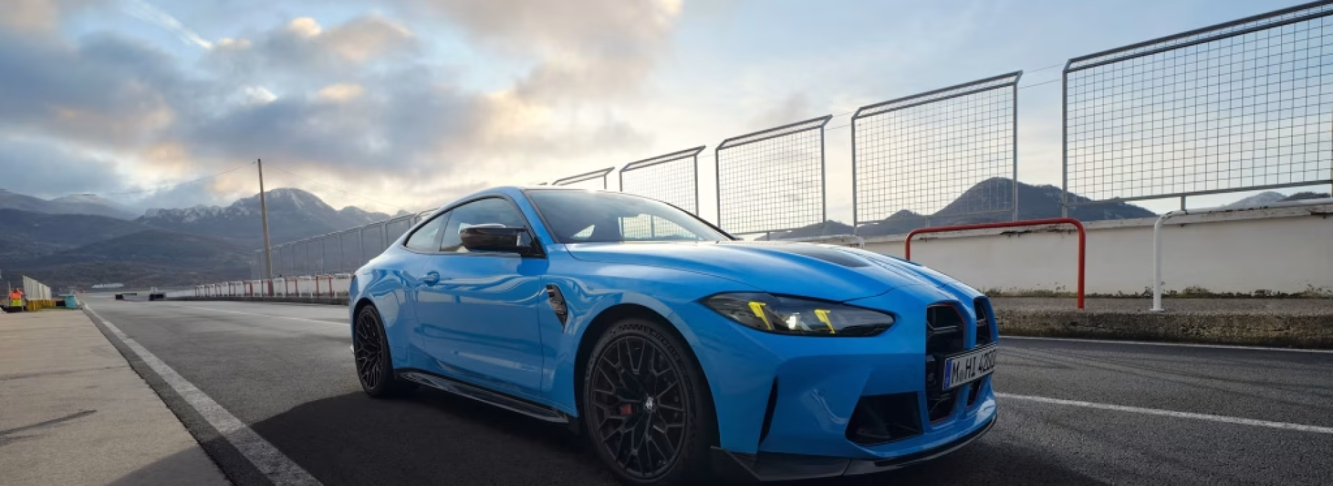 “Front view of the BMW M4 CSL showcasing its aggressive design and carbon details”